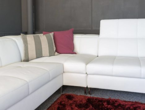 White upholstered couch that has been professionally cleaned