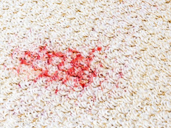 Red Wine Stain on White Rug